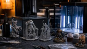 Photorealistic 3D printing scene for How to 3D Print High-Detail Miniatures (Complete Guide)